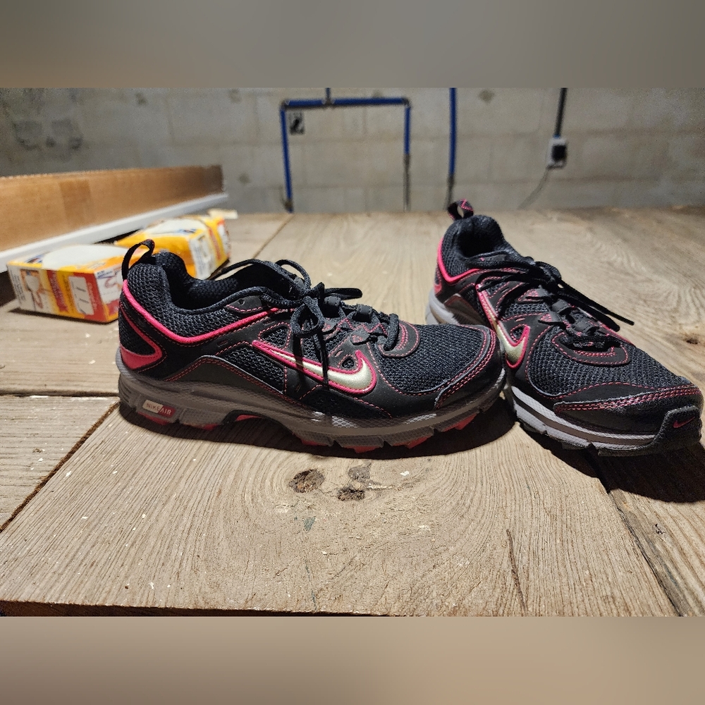 Nike Black and Pink Athletic Shoes with Supportive Sole